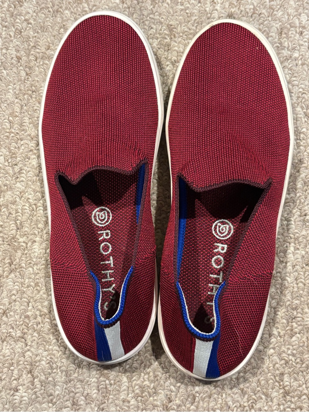 Rothy's Slip-On Sneakers in Burgundy with Blue and White Heel Stripe